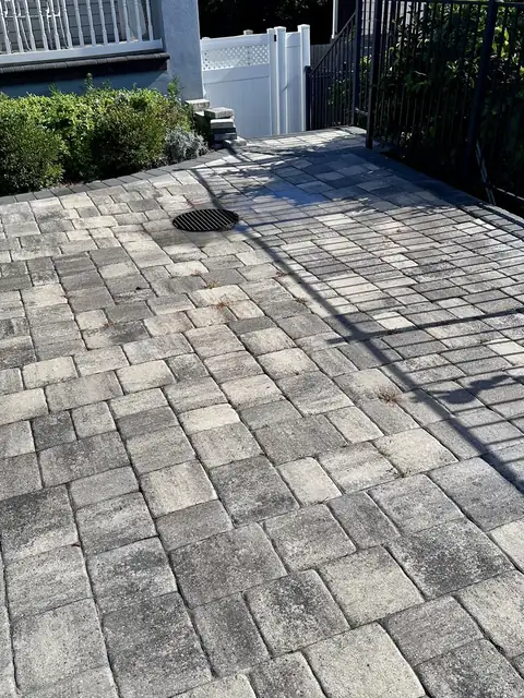 The same paver patio after rust removal